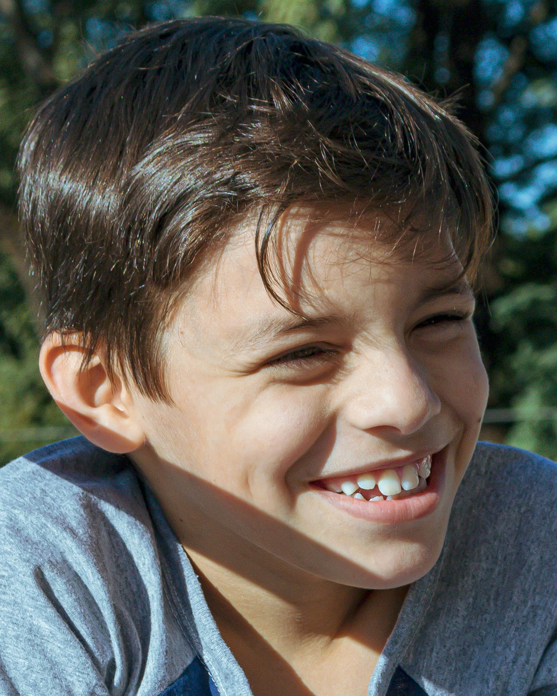 A close-up shot of a boy smiling | Source: Pexels