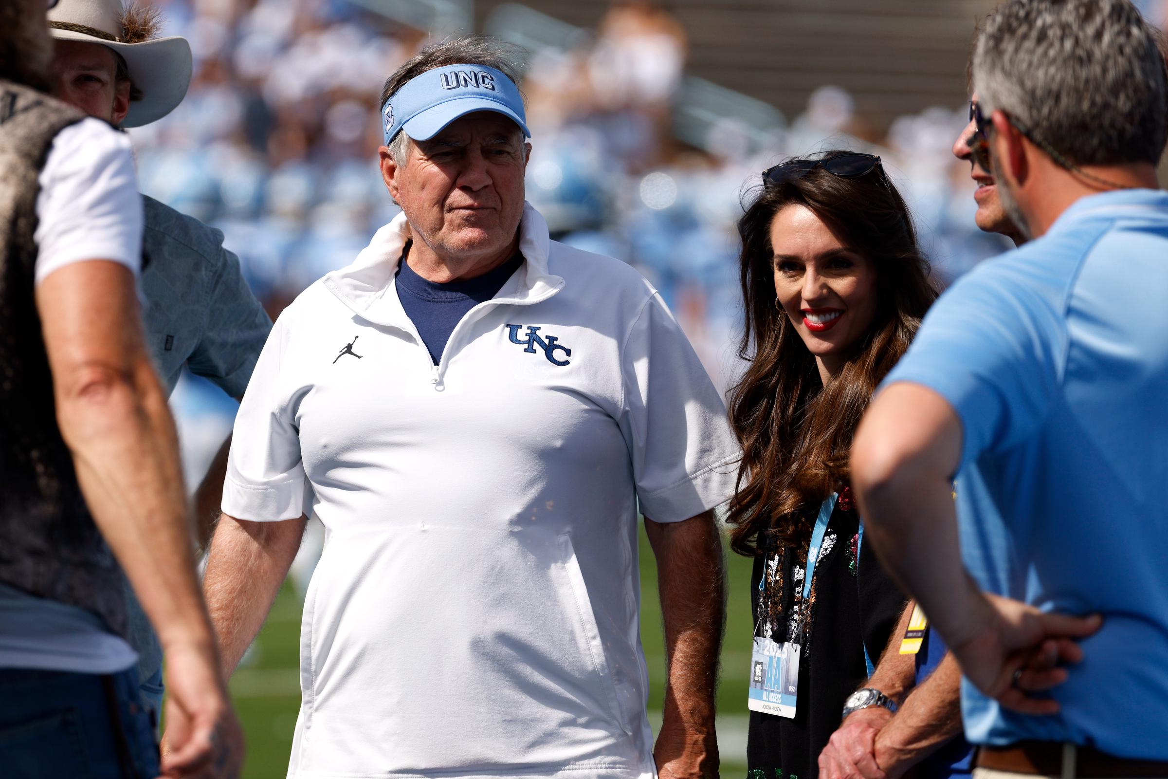Bill Belichick and Jordon Hudson before the game between the North Carolina Tar Heels and the Richmond Spiders in Chapel Hill, North Carolina on September 13, 2025. | Source: Getty Images