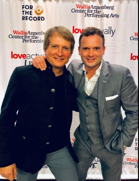 Rex Smith with his son, Brandon, from a post dated December 17, 2018. | Source: Facebook/REX SMITH