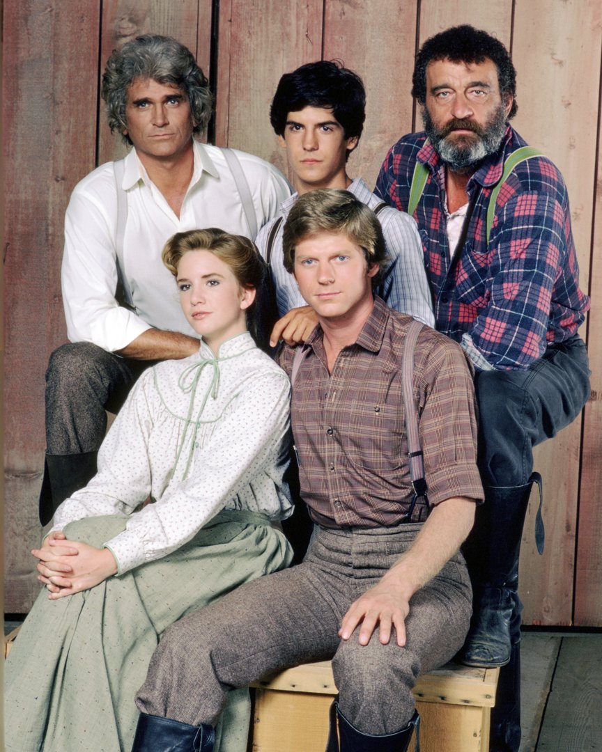 Michael Landon (1936 - 1991) as Charles Ingalls, Matthew Laborteaux as Albert Ingalls, Victor French as Isaiah Edwards, Dean Butler as Almanzo Wilder, and Melissa Gilbert as Laura Ingalls Wilder in the TV series 