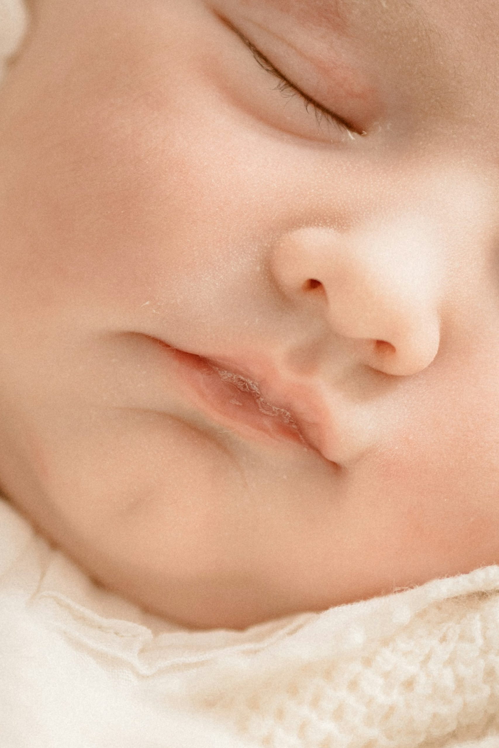 Close-up shot of a baby fast asleep | Source: Unsplash