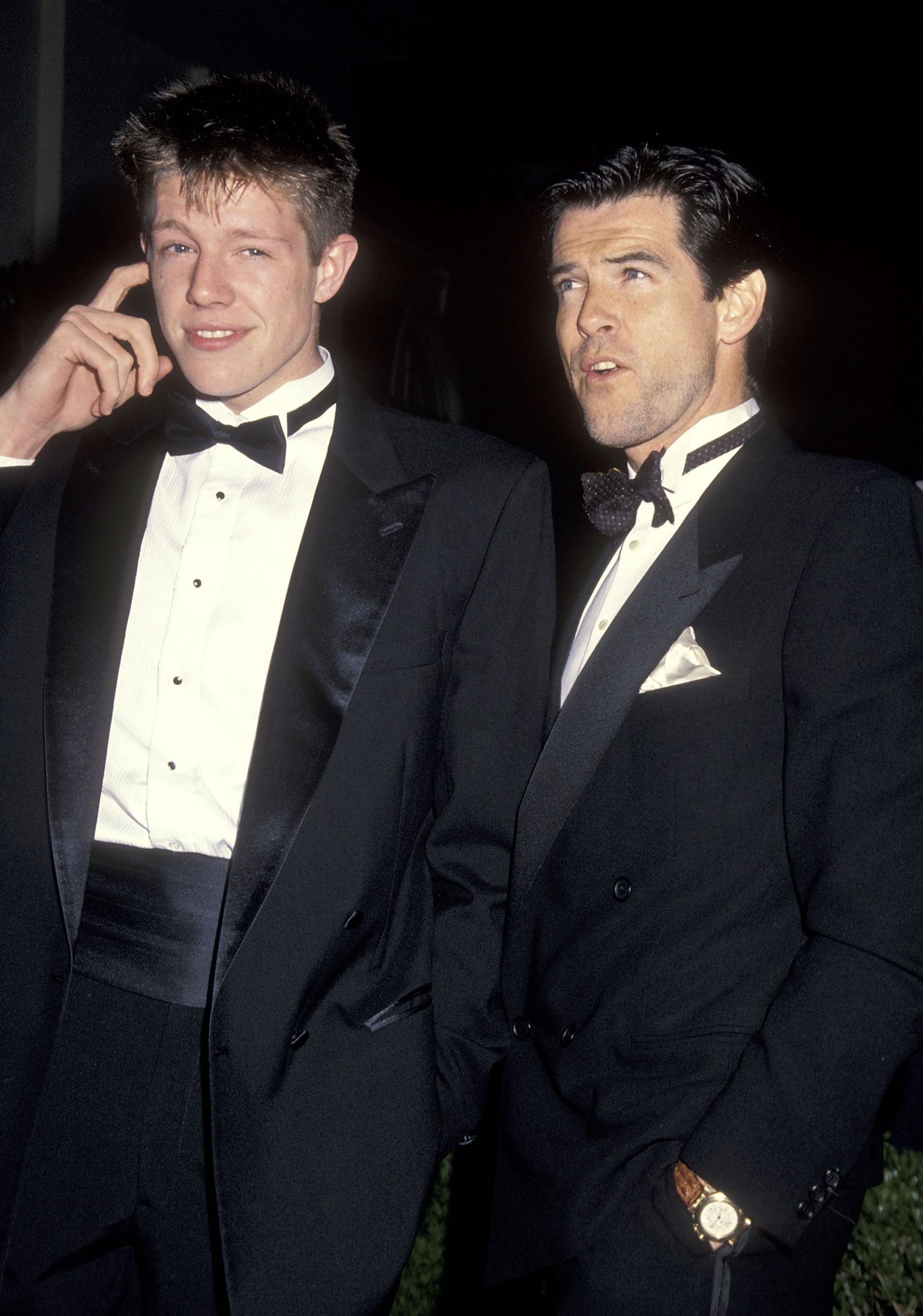 Christopher and Pierce Brosnan at the 64th Annual Academy Awards Pre-Party in Hollywood, California on March 27, 1992 | Source: Getty Images