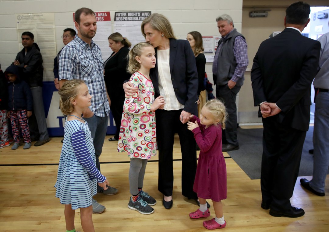 Abigail Spanberger waits in line to vote with her daughters Charlotte, Claire, and Catherine and her husband Adam Spanberger at Deep Run High School on November 6, 2018, in Glen Allen, Virginia | Source: Getty Images