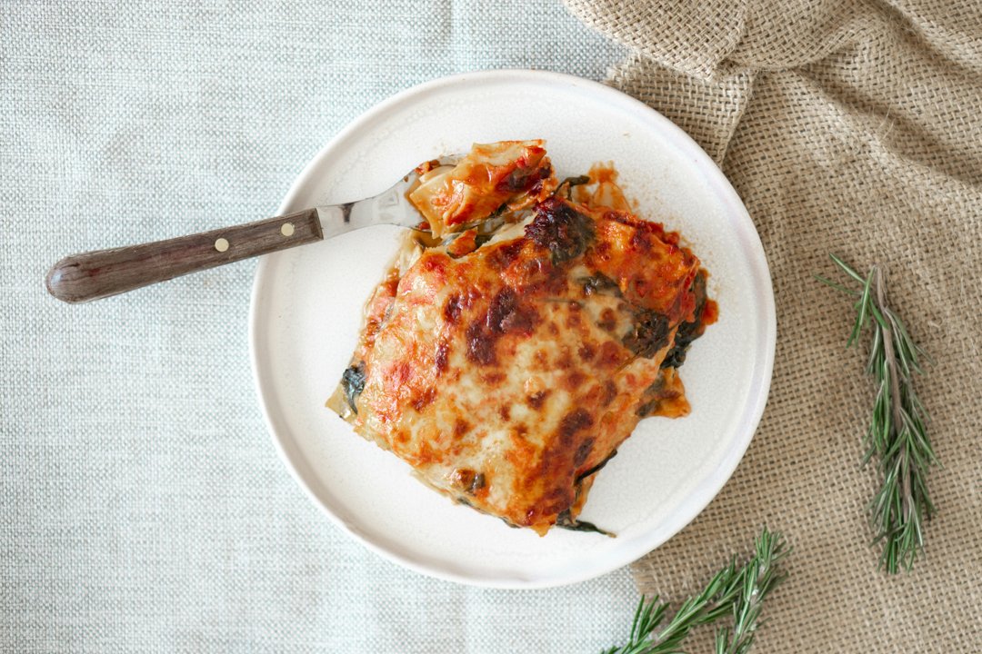 A piece of lasagna on a plate | Source: Pexels