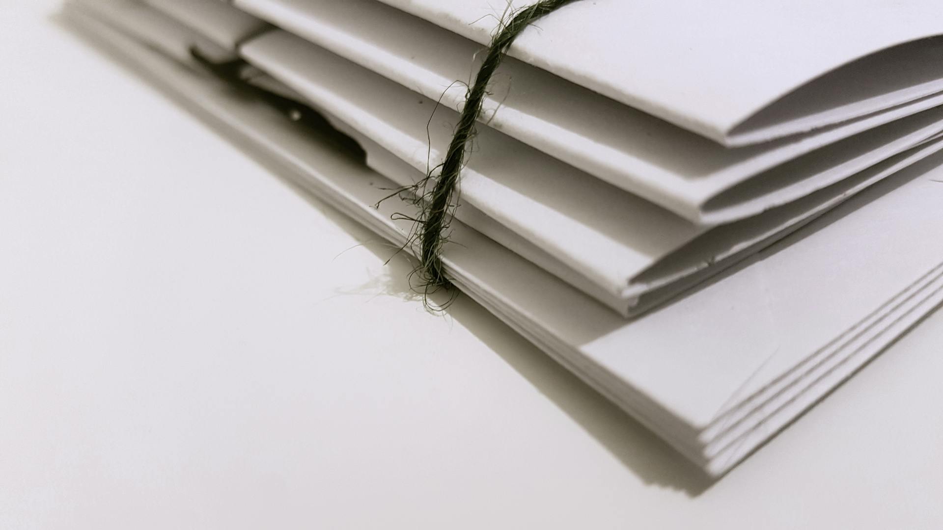 A close-up shot of files on a table | Source: Pexels