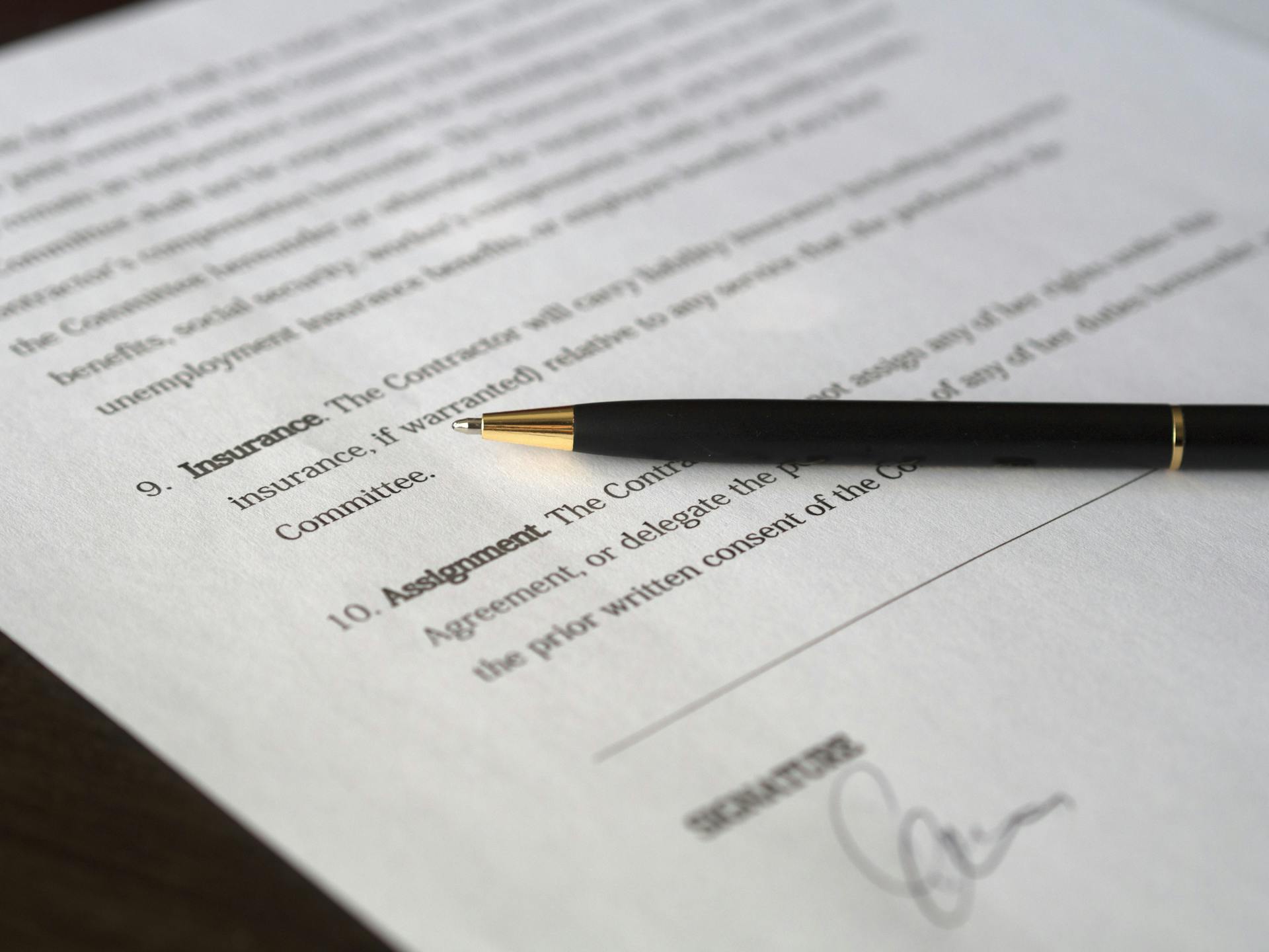 A pen placed on a paper | Source: Pexels