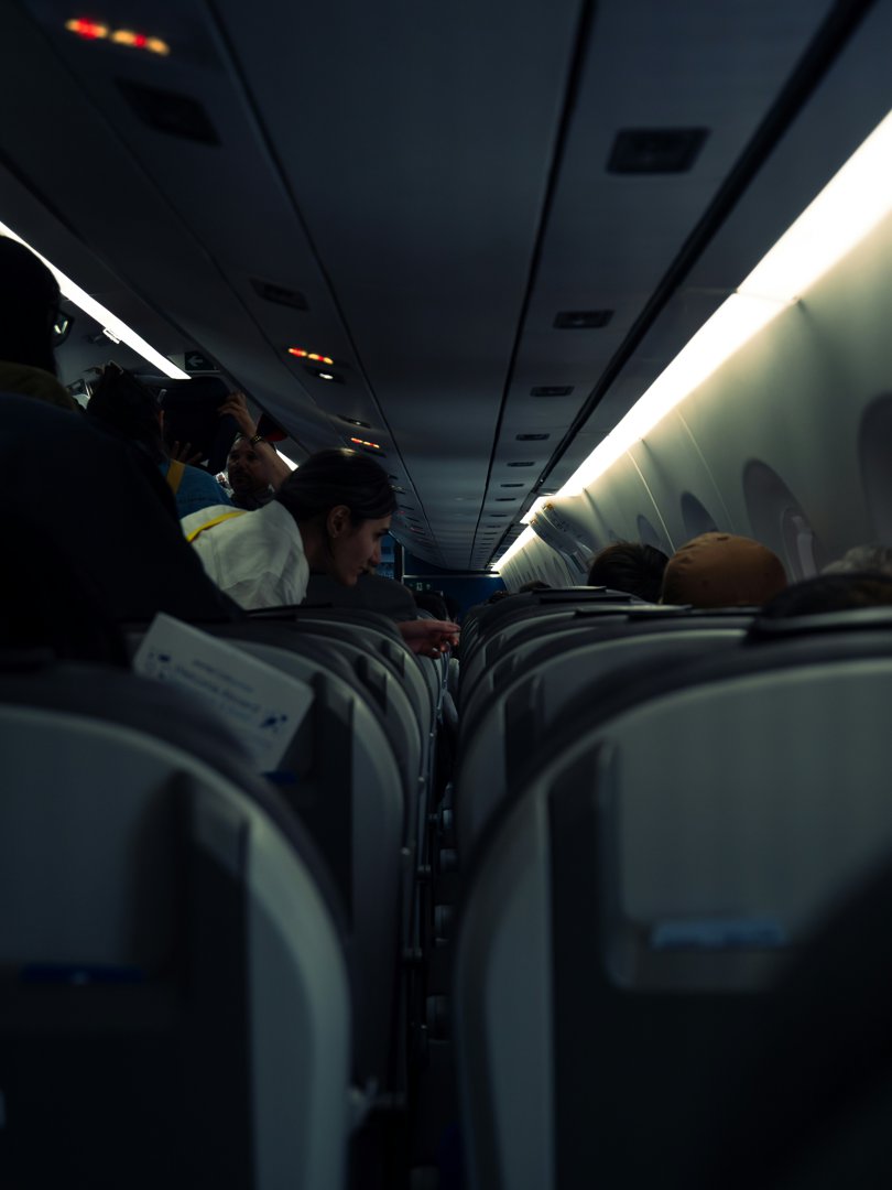 People sitting in an airplane | Source: Unsplash