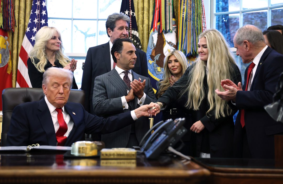 US President Donald Trump and Erika Kirk hold hands during the swearing-in ceremony of US Ambassador to India Sergio Gor in the Oval Office of the White House on November 10, 2025, in Washington, DC | Source: Getty Images