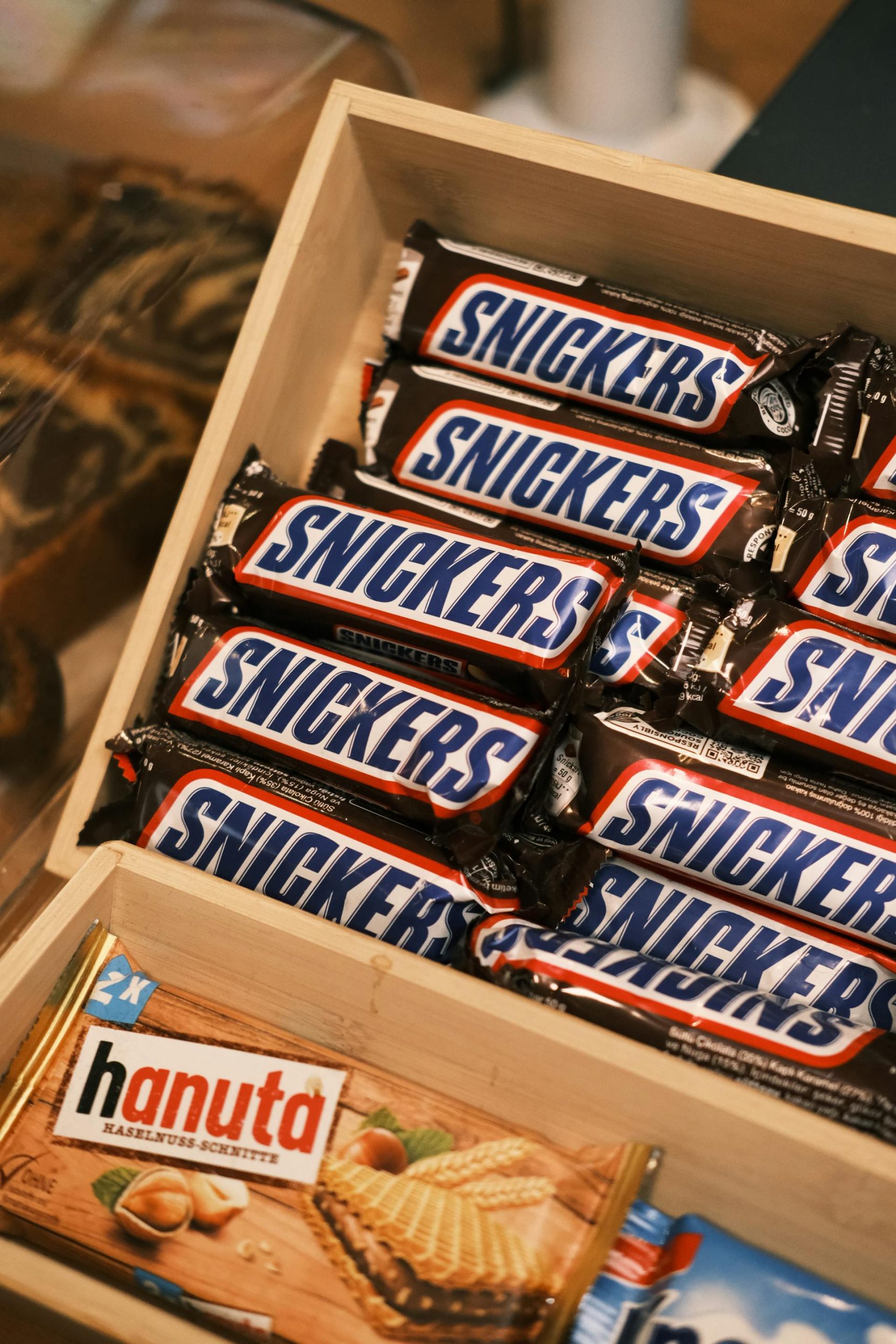 Candy bars in a display box | Source: Pexels