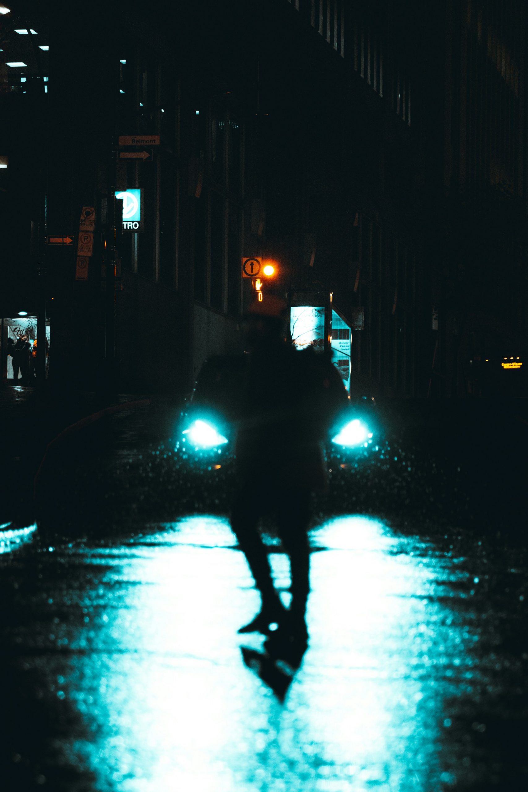 Silhouette of a person walking in the rain | Source: Unsplash