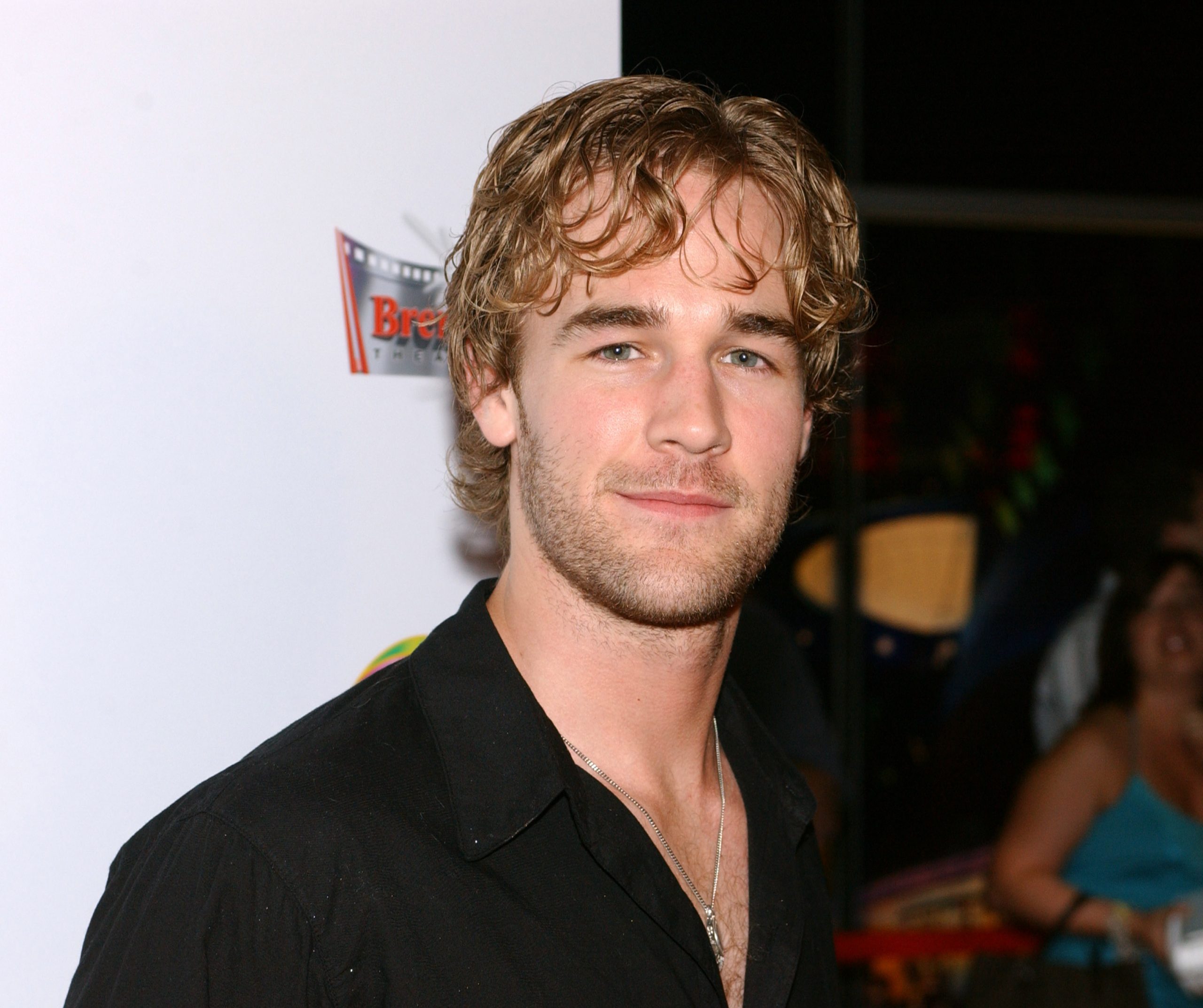 James Van Der Beek stands with relaxed confidence at the CineVegas premiere, his tousled curls and trimmed beard adding cinematic charm. In an unbuttoned black shirt and simple chain, he exudes effortless cool, his calm smile completing the laid-back star look.