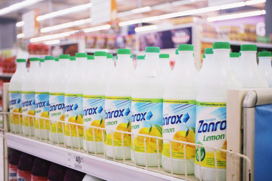 Bottles of bleach in a store | Source: Pexels