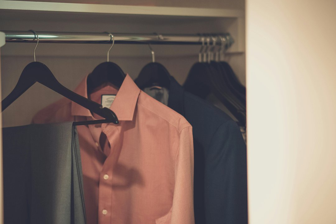 Clothing hanging in a closet | Source: Pexels