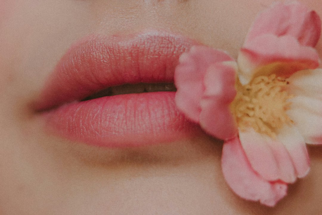 A woman's pale pink lipstick | Source: Unsplash