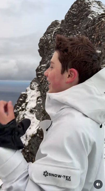 Ben Travolta admiring the view from the summit of a mountain | Source: Instagram/johntravolta