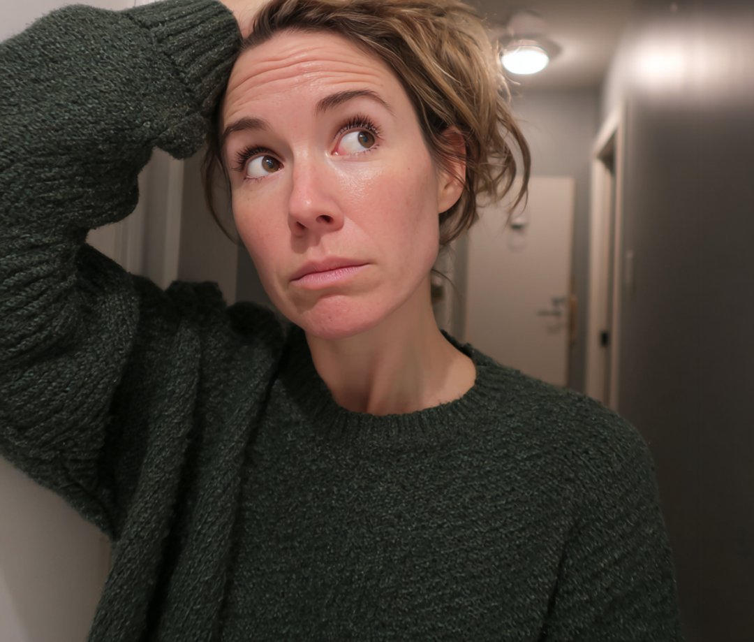 A concerned woman standing with her hand on her head | Source: Midjourney
