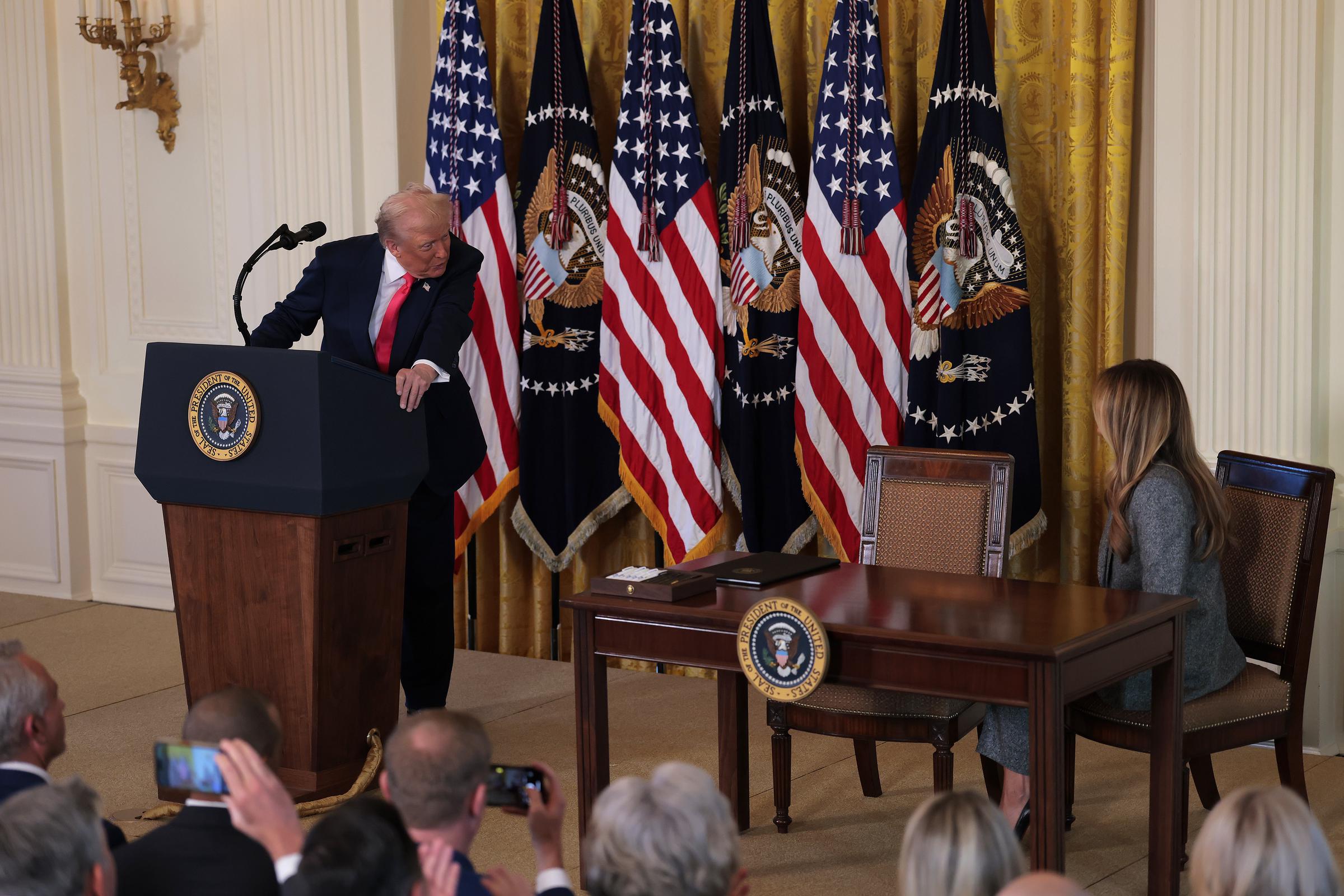 Donald Trump delivers remarks during the signing ceremony for the 