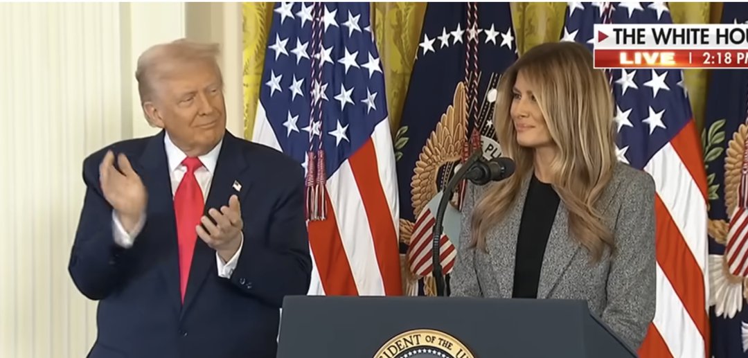 Donald Trump claps as Melania wraps up her speech during an executive order signing in the East Room of the White House in Washington, DC, on November 13, 2025 | Source: YouTube/@FoxNews