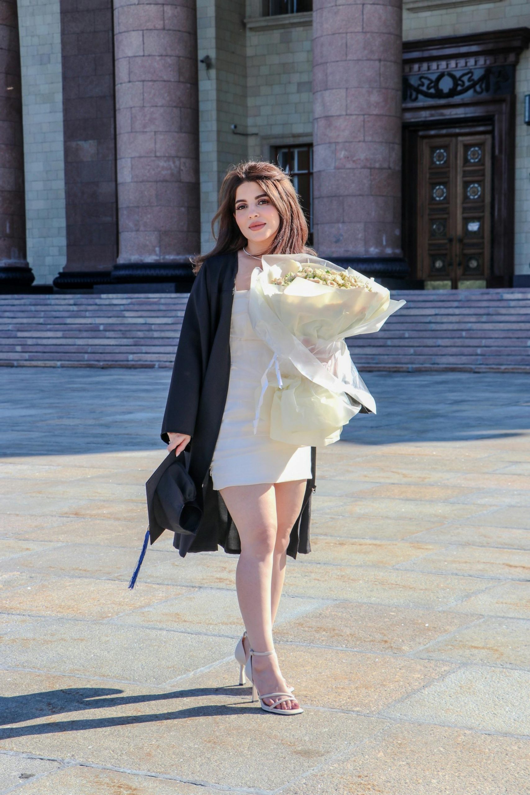A woman at her graduation | Source: Pexels