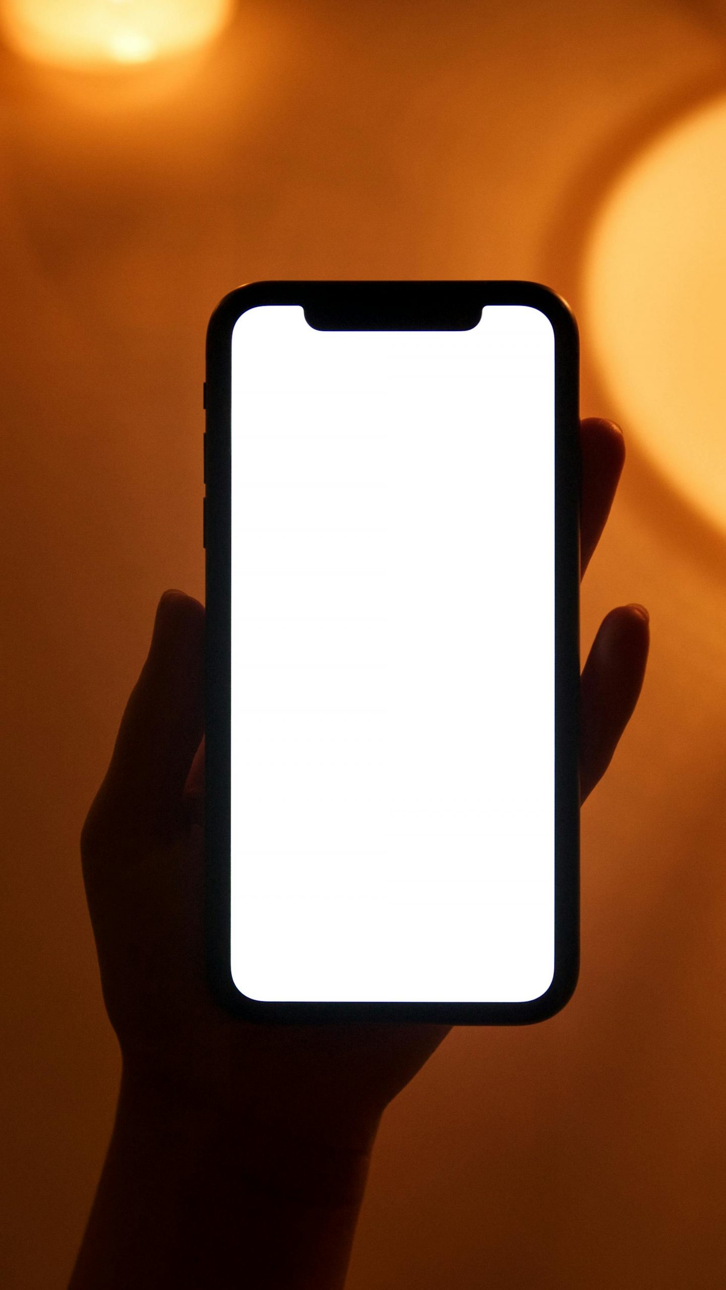 A person holding their phone | Source: Pexels