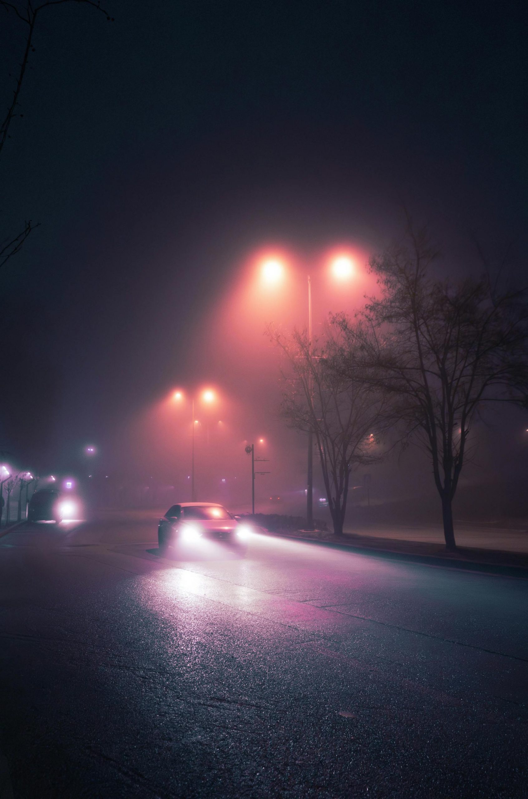 A car on the road at night | Source: Pexels