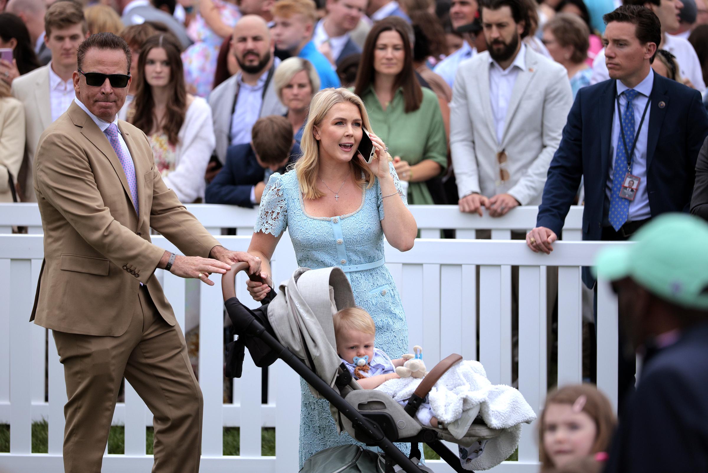 Karoline Leavitt, her husband Nicholas Riccio, and their son are at the South Lawn of the White House in Washington, DC on April 21, 2025. | Source: Getty Images