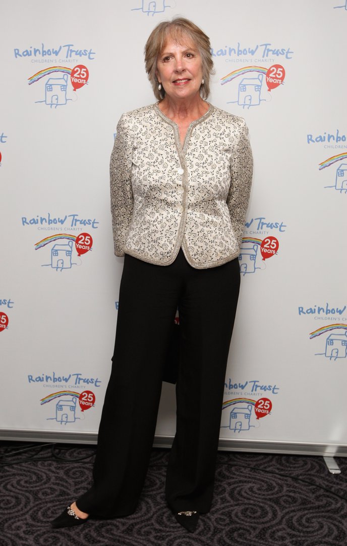 Penelope Wilton attended the Rainbow Trust's Silver Jubilee Ball in 2011 wearing a cream embroidered jacket and black trousers. With minimal jewellery and a natural makeup look, she radiated quiet poise and warmth — qualities reflected in her role as the steadfast Isobel Crawley.