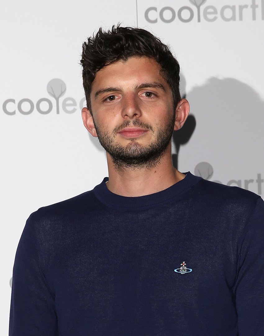 Michael Fox attended the 2015 launch party for Cool Earth in London with a youthful, laid-back style. Wearing a simple navy crewneck and sporting a short, tousled haircut, he struck a casual figure far removed from the footman he would later portray on