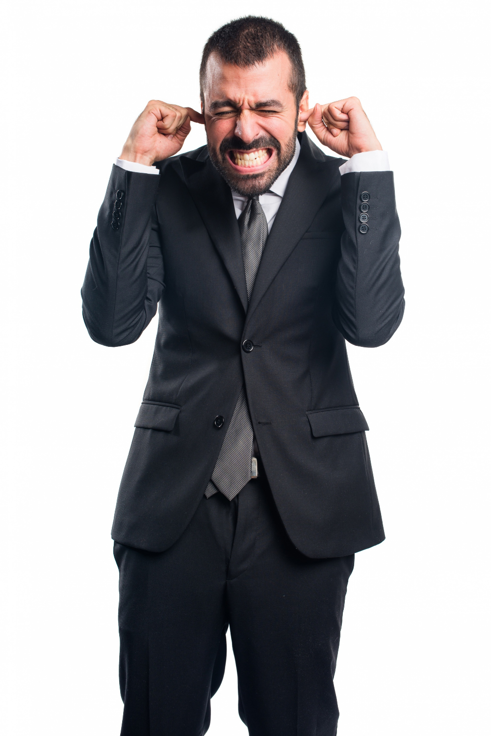 An annoyed man covering his ears | Source: Freepik