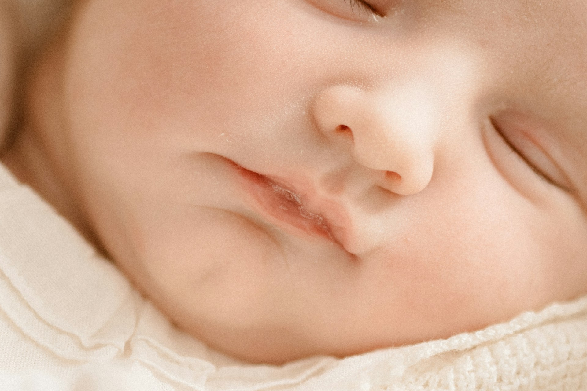Close-up shot of a baby fast asleep | Source: Unsplash