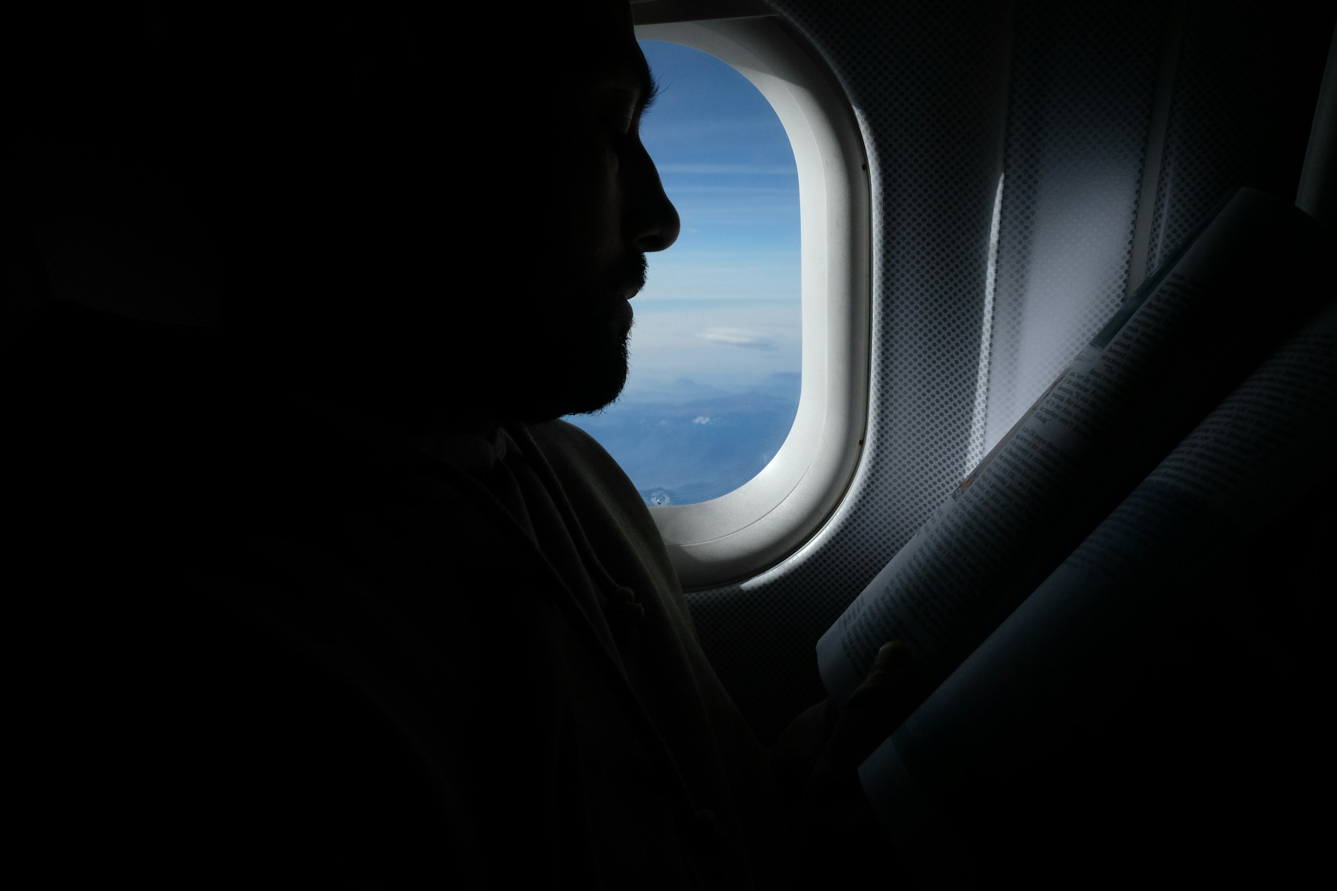 A man sitting on a plane | Source: Unsplash