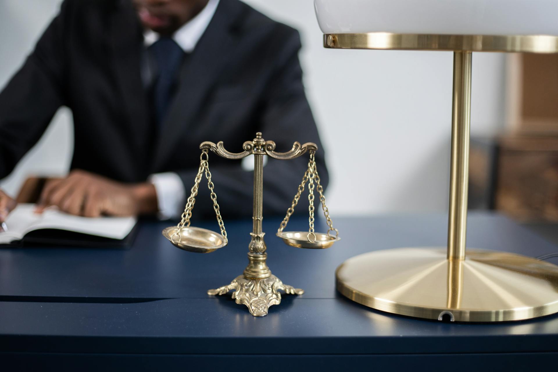 A lawyer working at a desk | Source: Pexels