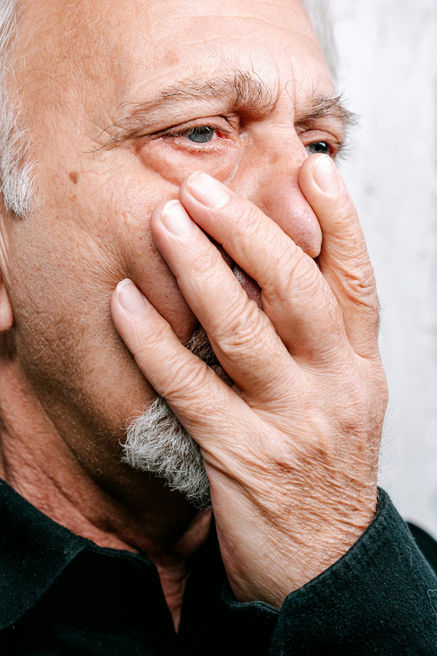 An emotional elderly man | Source: Pexels