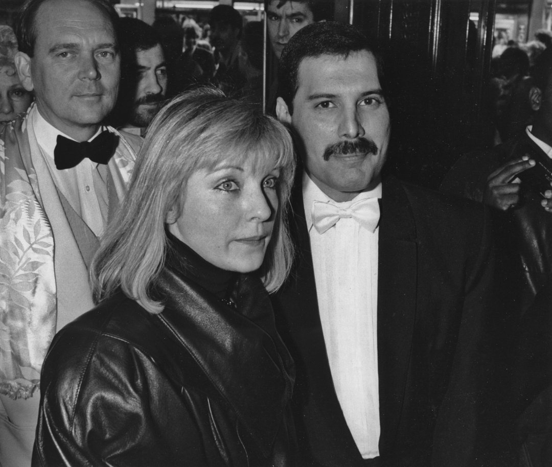 Freddie Mercury (1946 - 1991) and Mary Austin at an after-party in London for 'Dave Clark's Time - The Musical', on 9 April 1986. | Source: Getty Images