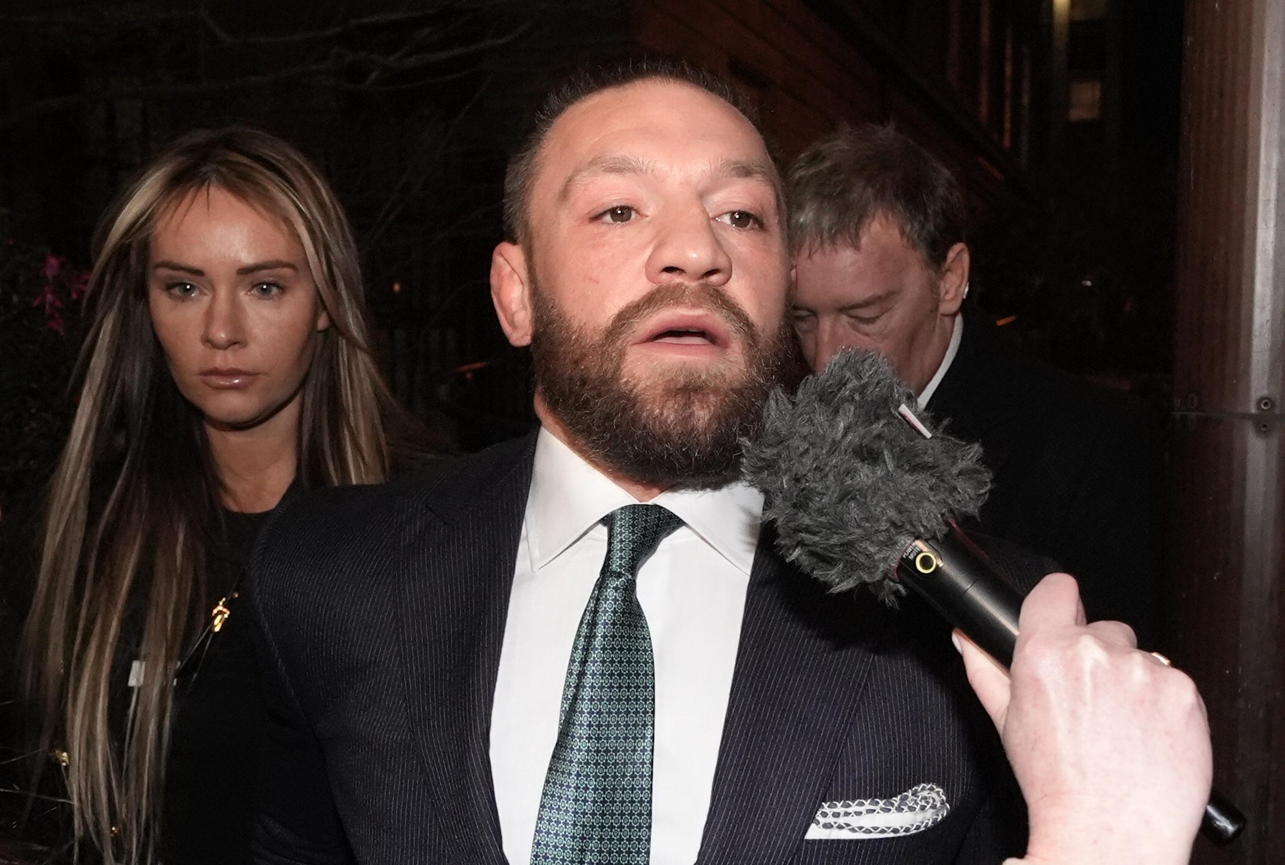 Conor McGregor and partner Dee Devlin leave the High Court in Dublin after the personal injury case against him on 22 Novemvber 2024. | Source: Getty Images