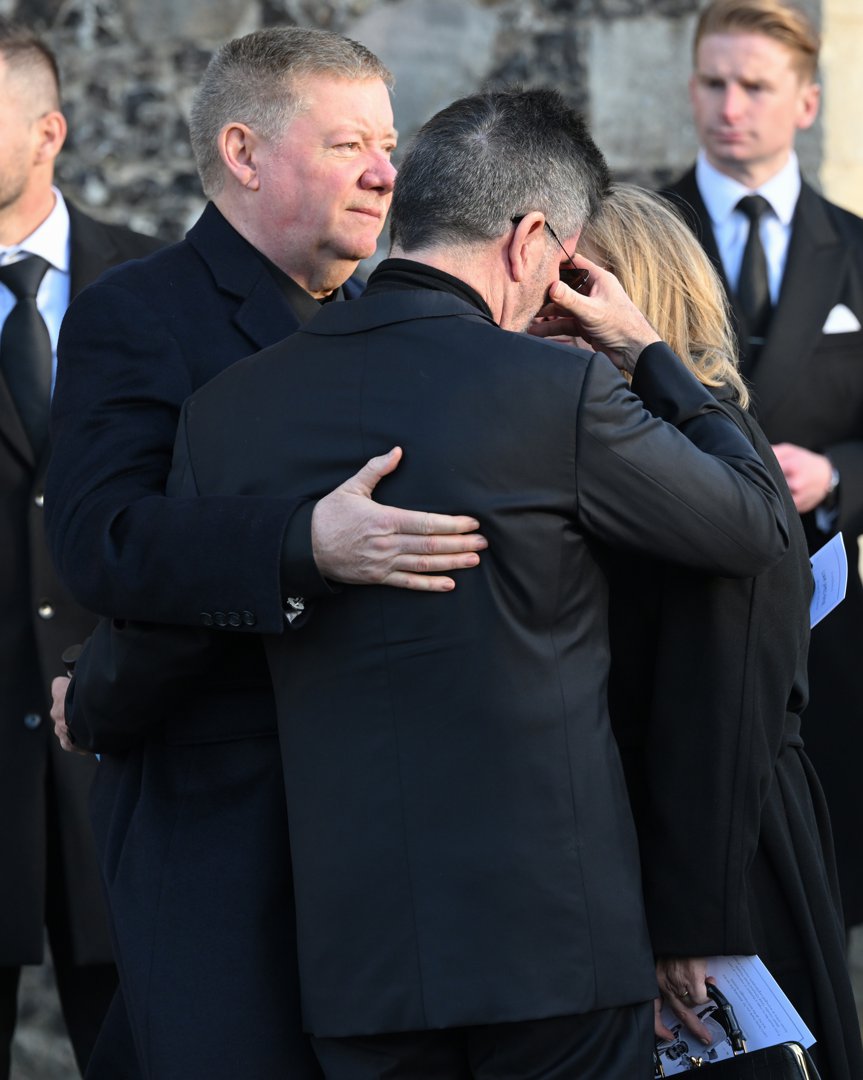 Simon Cowell with Liam Payne's parents at the singer's funeral at St. Mary's Church on November 20, 2024, in Amersham, England. | Source: Getty Images