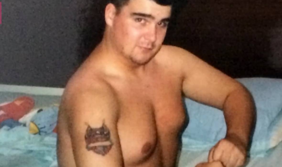 Before the ink took over: King of Ink Land King Body Art The Extreme Ink-ite pictured shortly after receiving his very first tattoo — a tribute to his beloved English bulldog. | Source: YouTube/BBC Three