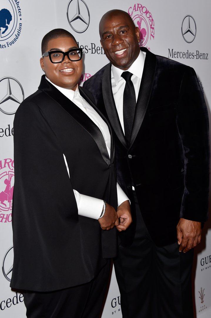EJ and Magic Johnson strike a stylish pose at the 2014 Carousel of Hope Ball. With polished tuxes and radiant smiles, the red carpet becomes a runway for legacy and elegance.