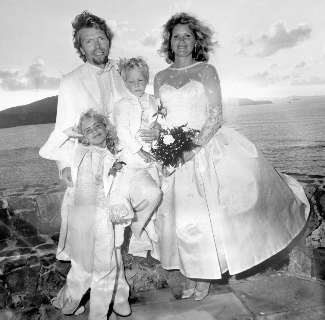 Richard Branson and his wife, Joan Templeman, with their children, Holly and Sam, after their wedding on the Caribbean island of Necker on 20 December 1989. | Source: Getty Images