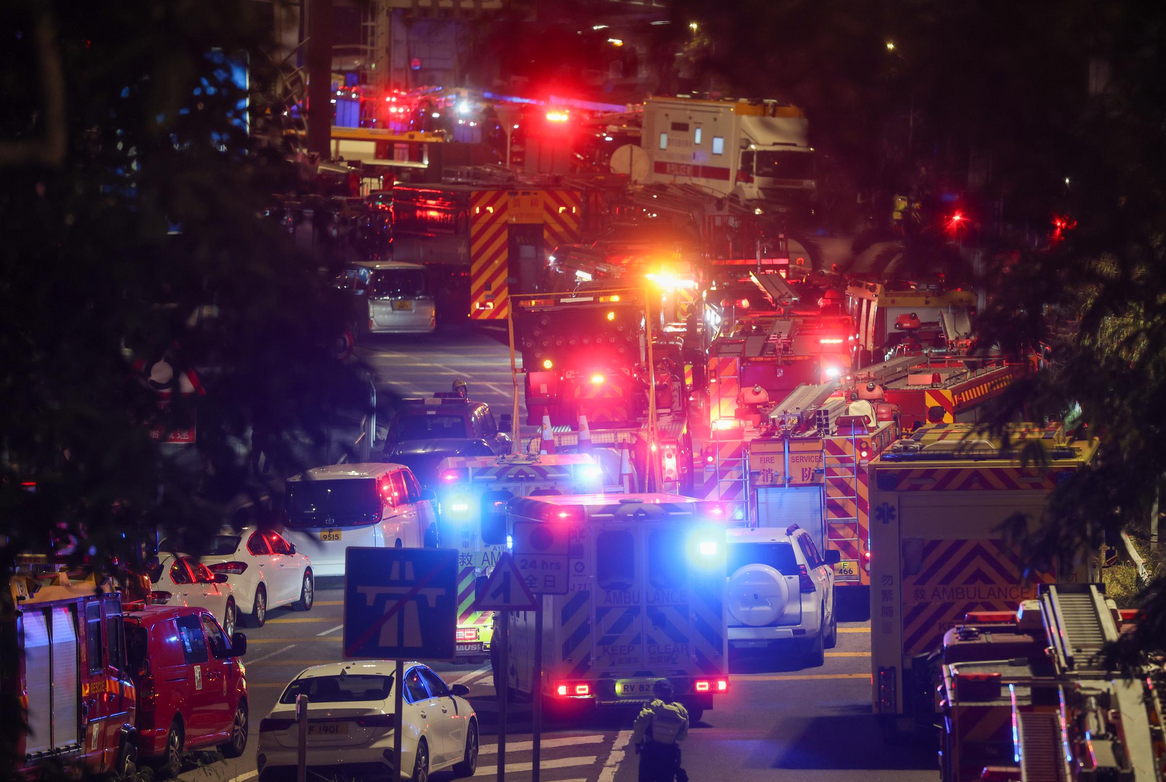 Emergency vehicles surround Wang Fuk Court as firefighters respond to the blaze in Tai Po, Hong Kong, on the night of November 26, 2025 | Source: Getty Images