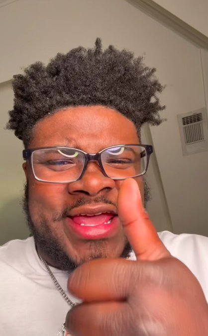 Marquay Collins giving a thumbs up at the end of the video. | Source: TikTok/@marquaythegoat
