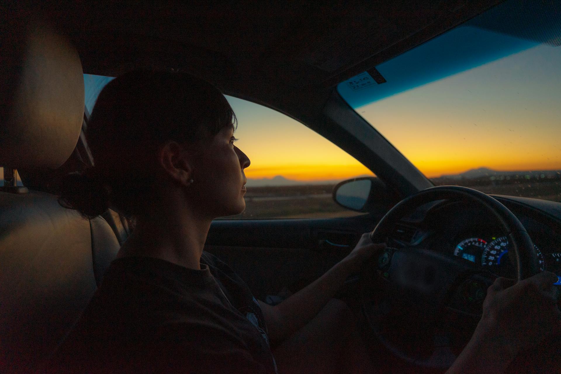 A woman driving a car | Source: Pexels
