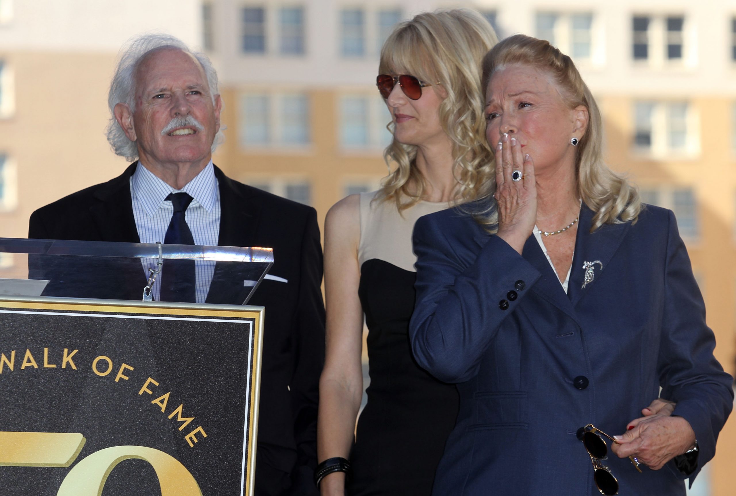 Diane Ladd, Laura Dern, and Bruce Dern attend their Walk of Fame star ceremony in Hollywood on November 1, 2010 | Source: Getty Images