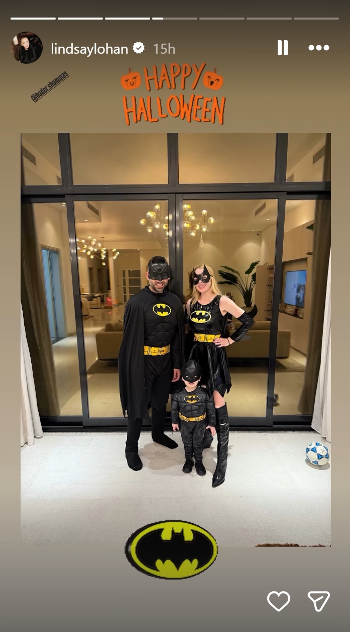 In a social media story dated October 31, 2025, Lohan and her family suited up as Gotham's finest for Halloween. Coordinating as the ultimate Batman trio, Lohan wore a black Batgirl dress with matching gloves and a utility belt, while her husband opted for the full caped crusader look, complete with a molded chest plate and mask. Their young son joined in as a mini Batman, donning a padded suit and mask for a heroic family moment that was both adorable and on theme. | Source: Instagram/lindsaylohan