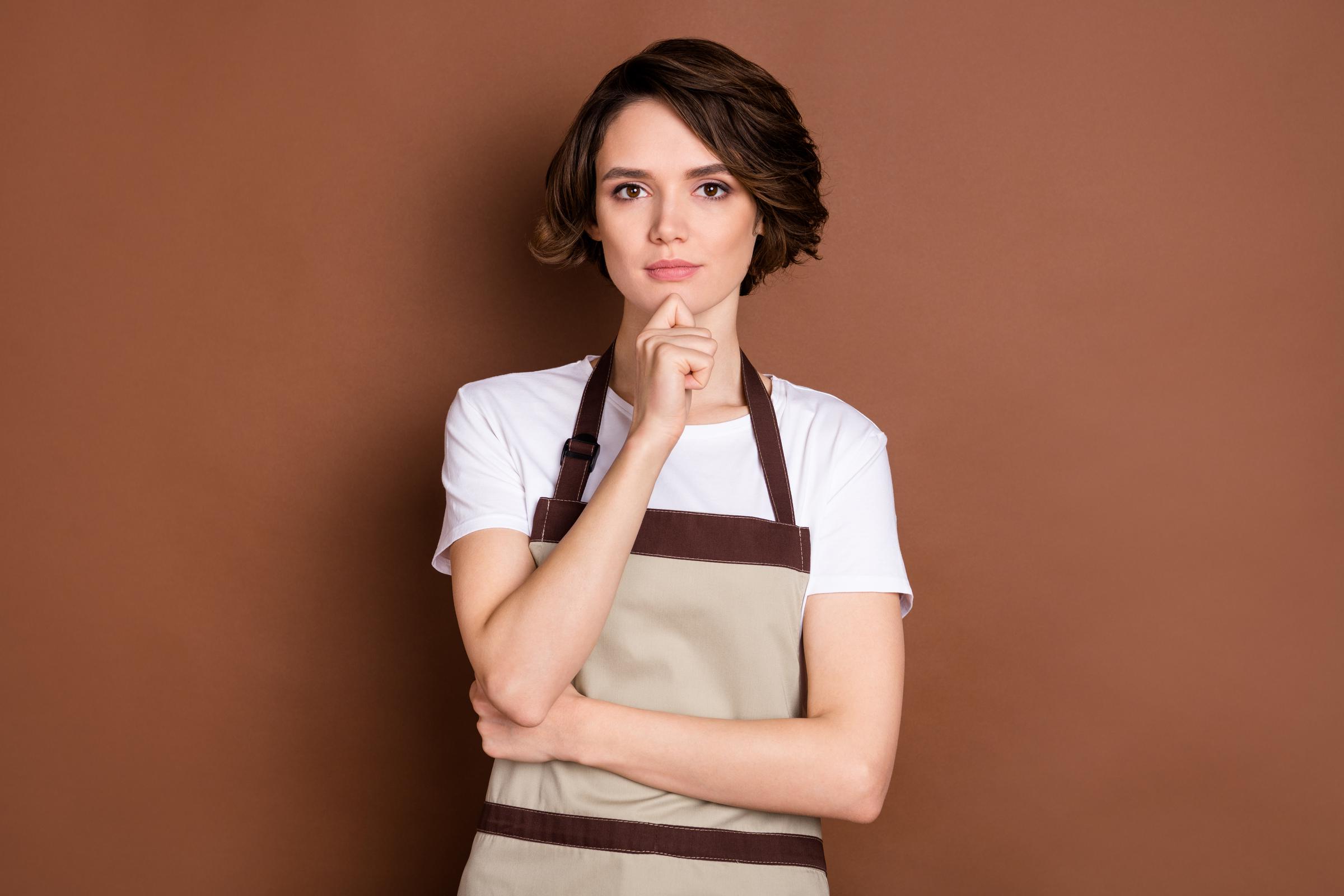 Waitress with a serious facial expression | Source: Shutterstock