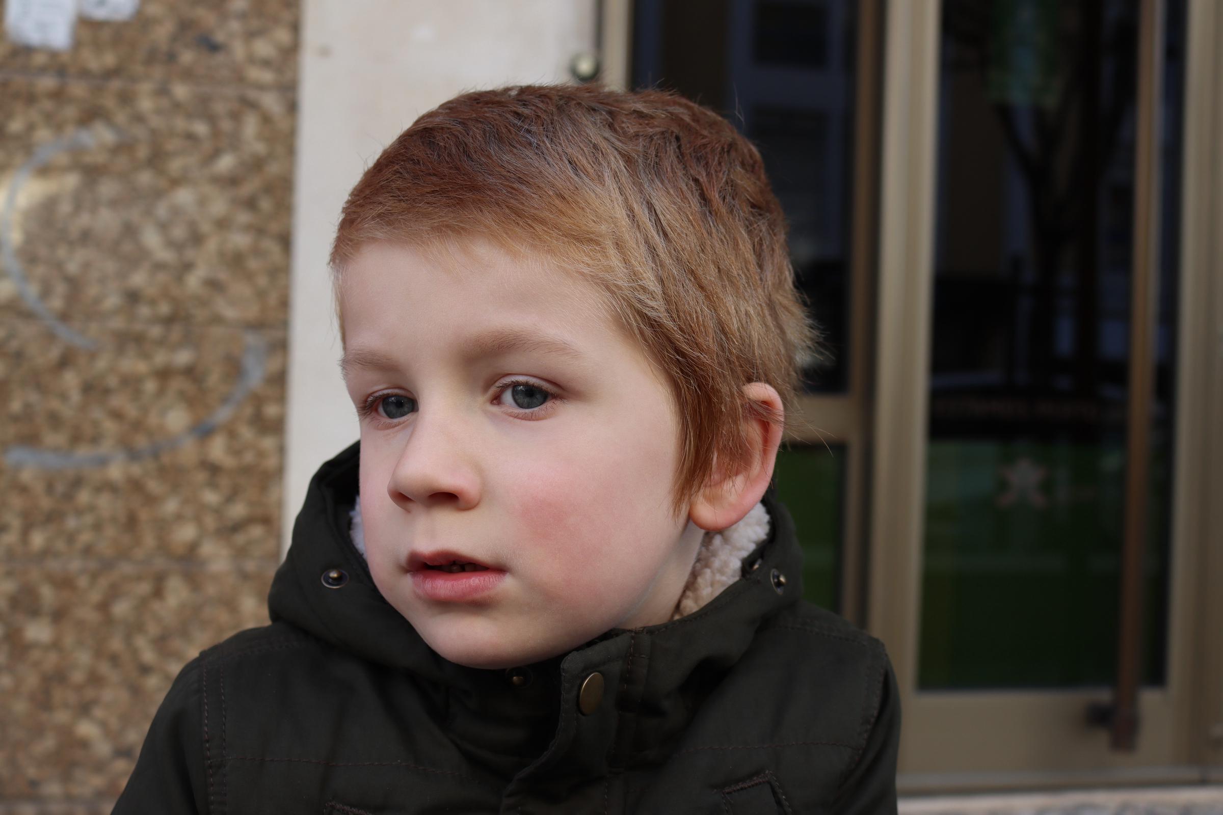 Blonde boy looking thoughtful | Source: Shutterstock