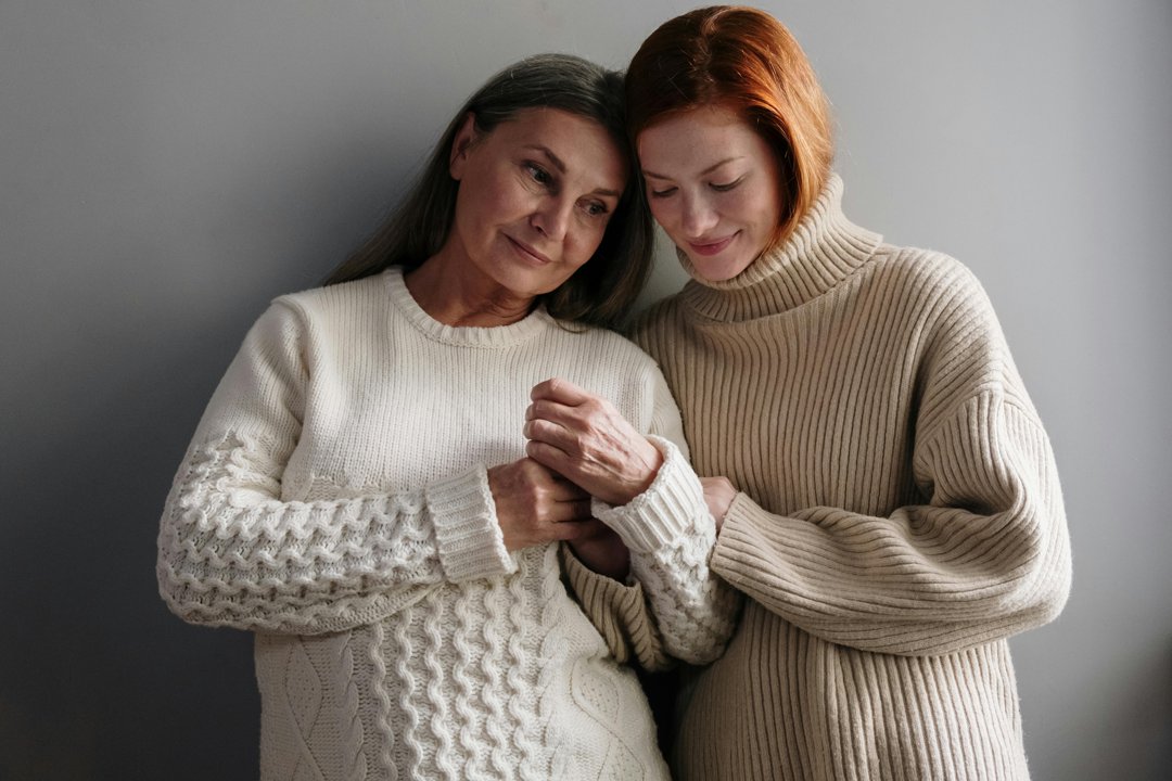 A mother and daughter sharing a touching moment | Source: Pexels