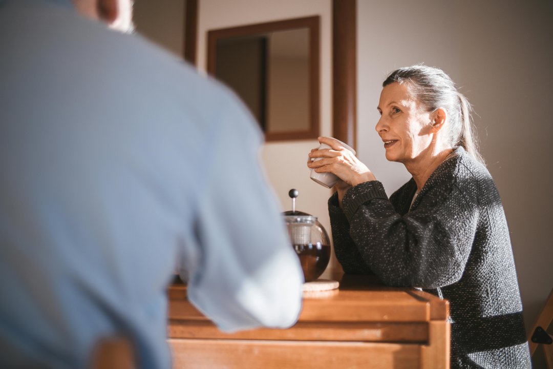 A man and woman sharing a hot beverage | Source: Pexels