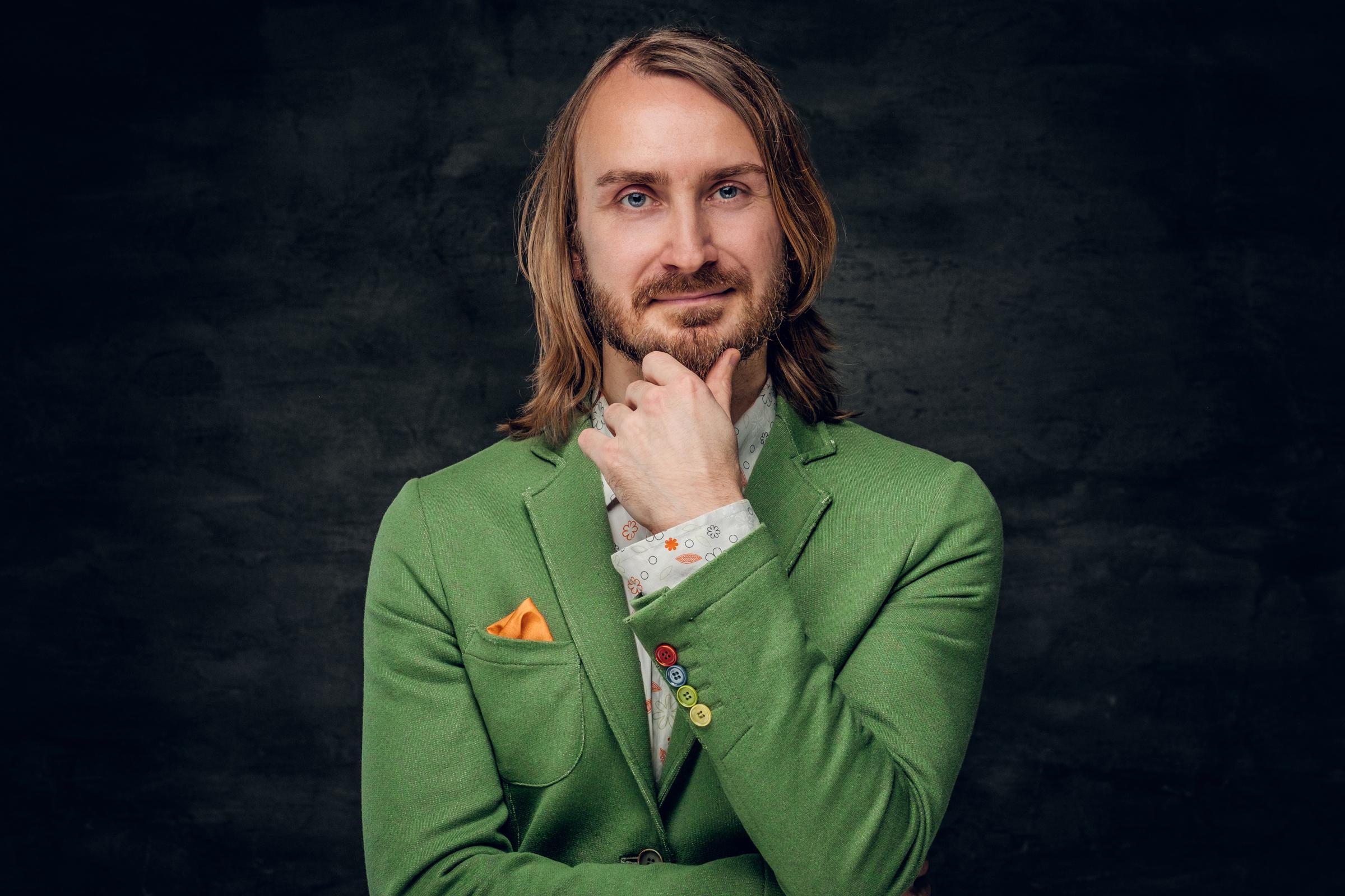 A man with a smirk | Source: Freepik