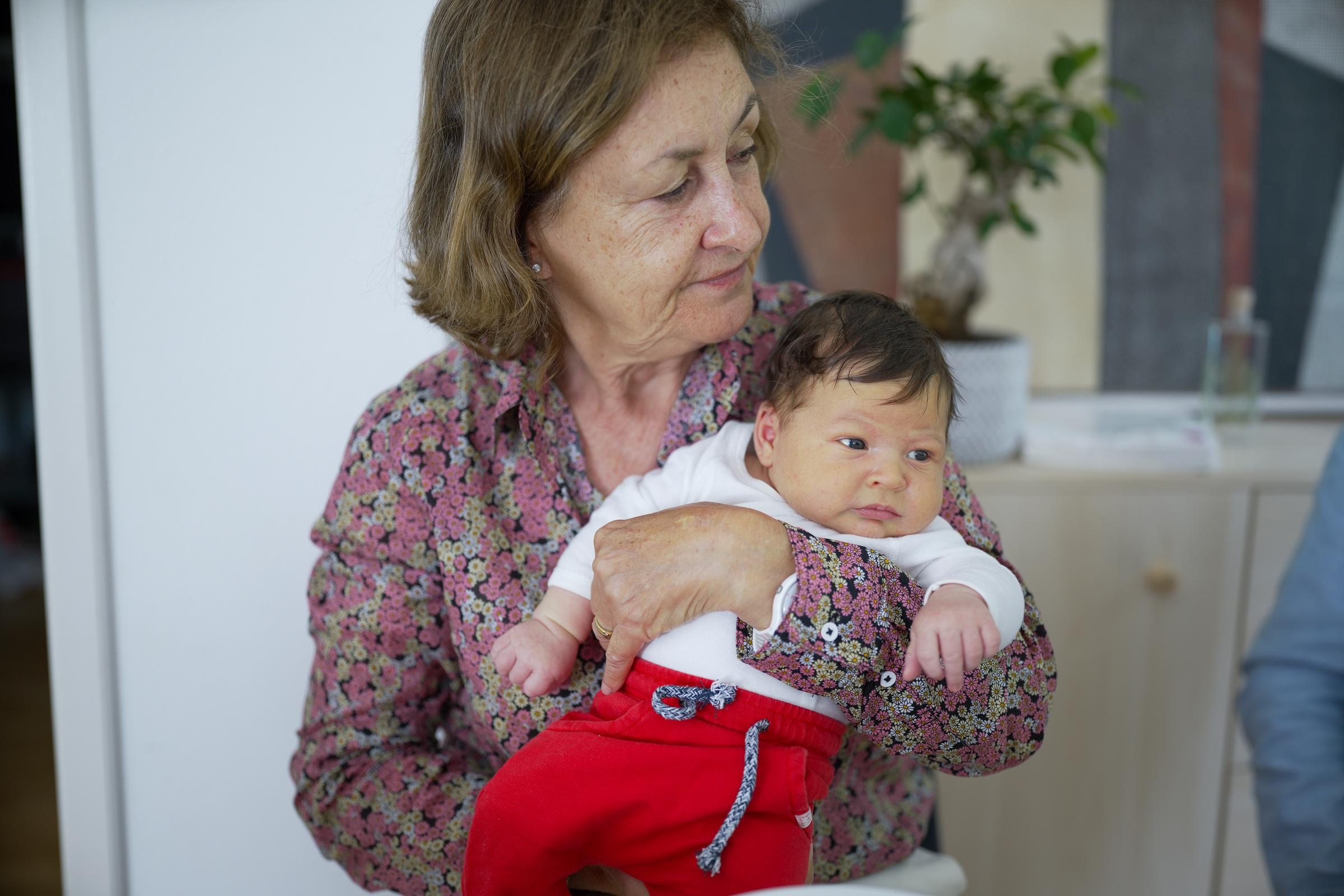 Senior woman admiring her grandchild | Source: Shutterstock